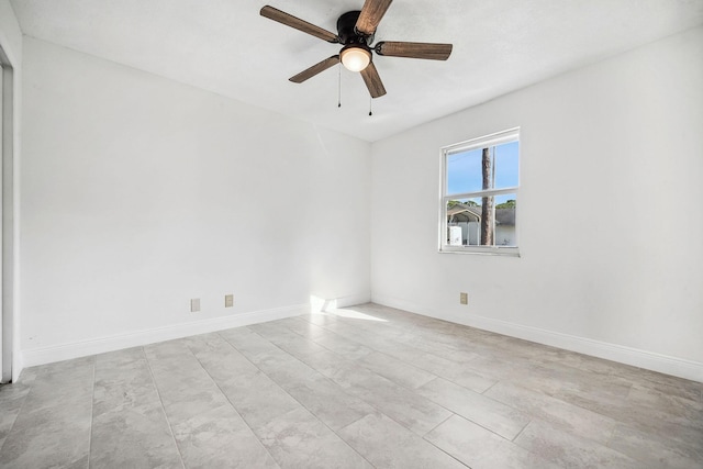 empty room featuring ceiling fan