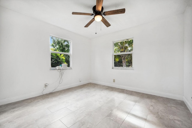 spare room featuring ceiling fan