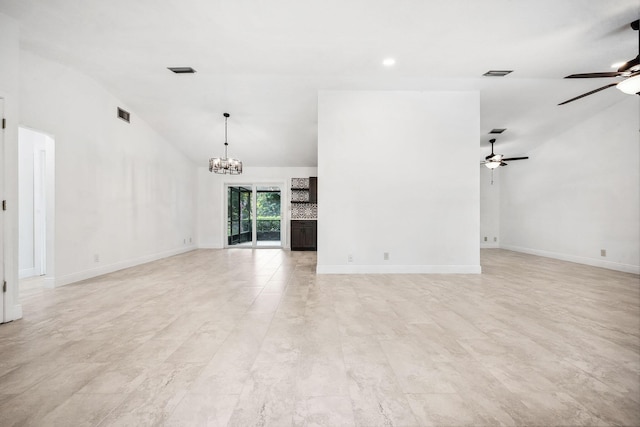 unfurnished living room with vaulted ceiling and ceiling fan with notable chandelier