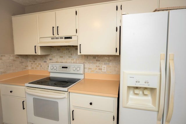 kitchen featuring white cabinetry, white appliances, and tasteful backsplash