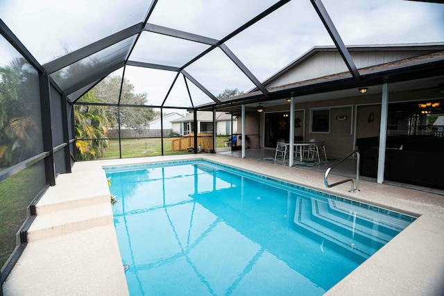 view of pool featuring a patio and a lanai