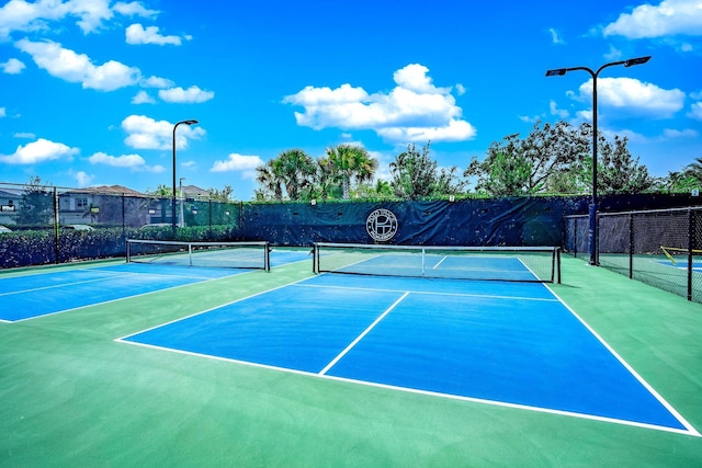 view of sport court featuring basketball court