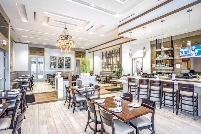 dining space featuring an inviting chandelier