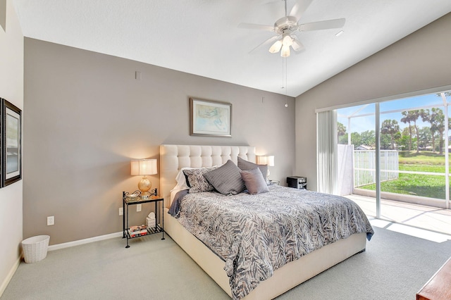 carpeted bedroom with ceiling fan, access to outside, and vaulted ceiling