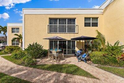 back of property with a patio