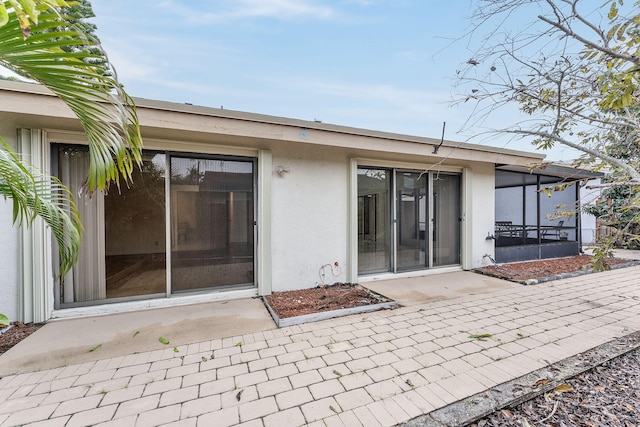 rear view of house featuring a patio