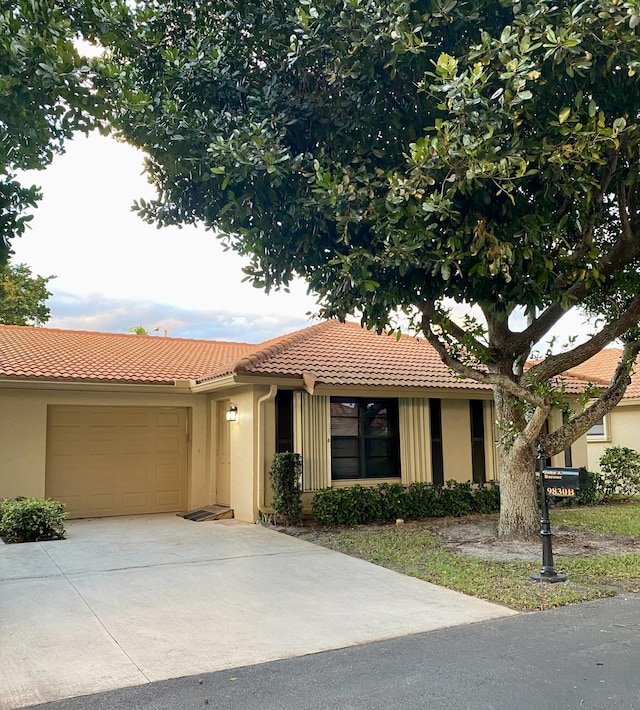 view of front of property featuring a garage