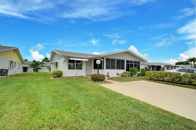 view of front facade with a front yard