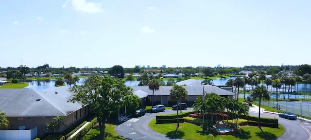 drone / aerial view with a water view