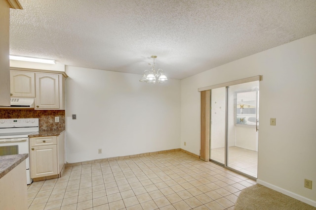 kitchen with hanging light fixtures, ventilation hood, backsplash, a notable chandelier, and white electric stove