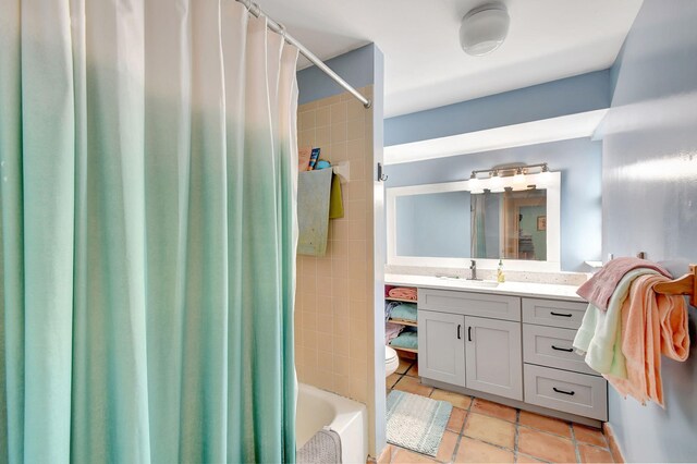 kitchen featuring sink, white cabinetry, dishwasher, decorative backsplash, and pendant lighting