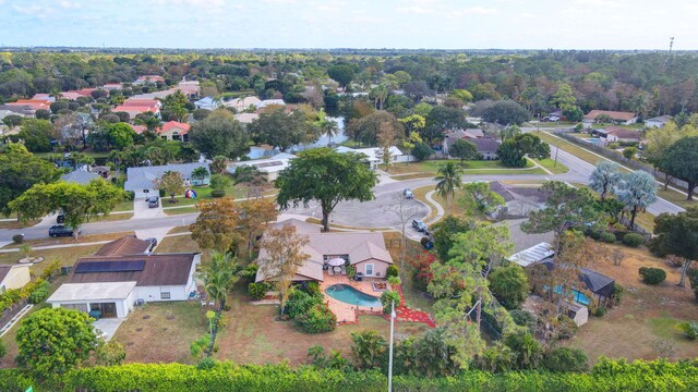 ranch-style home with a front lawn and a garage