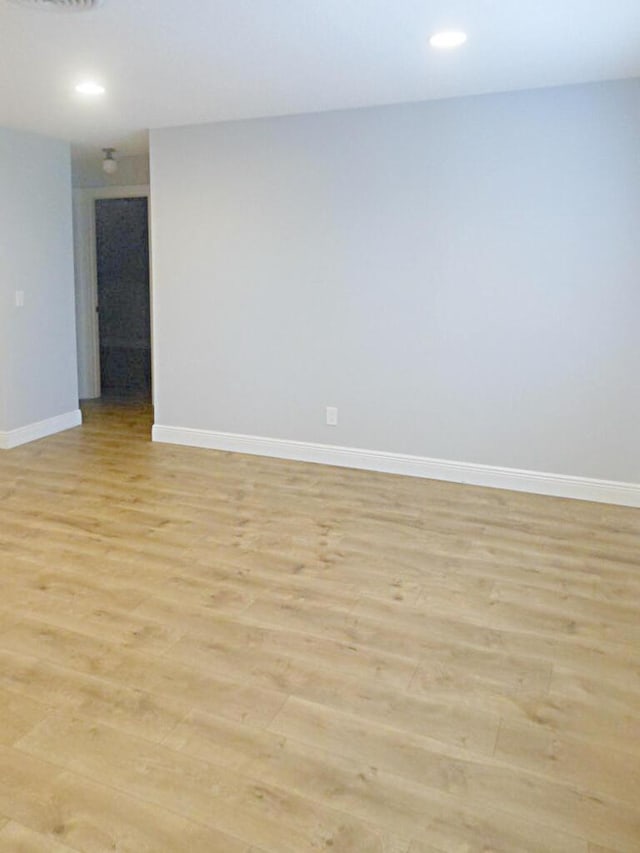 empty room featuring light hardwood / wood-style floors