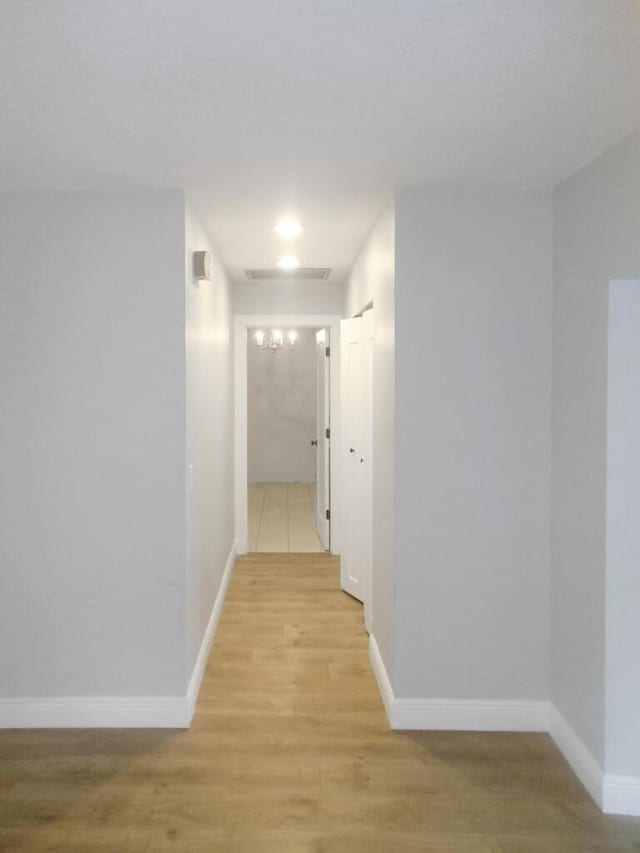 hall featuring light wood-type flooring