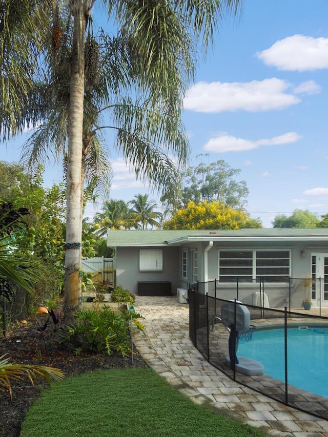 rear view of property with a patio