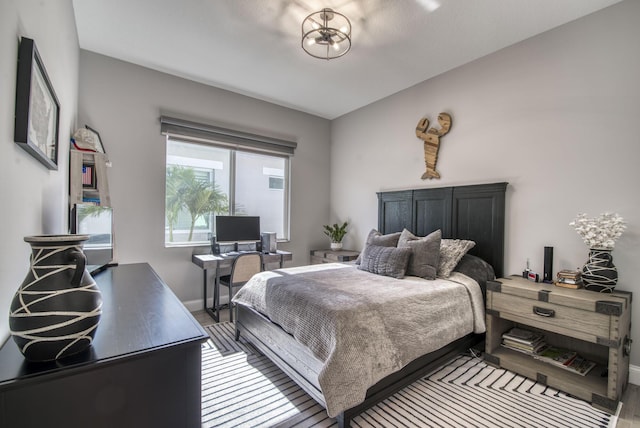 bedroom featuring hardwood / wood-style floors