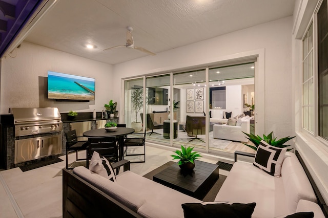 view of patio with ceiling fan, an outdoor hangout area, a grill, and area for grilling