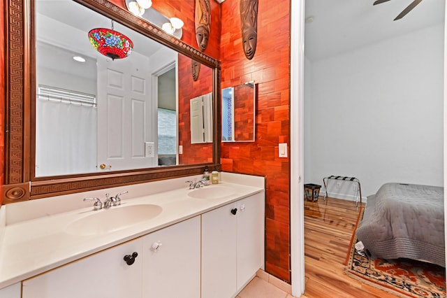 bathroom featuring vanity and ceiling fan