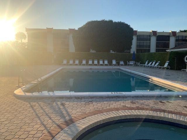 view of pool featuring a patio