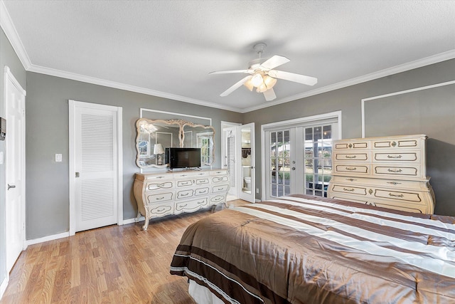 bedroom with ceiling fan, crown molding, access to outside, and french doors