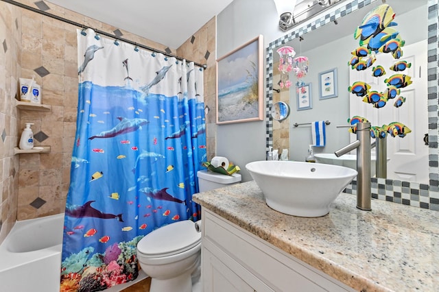 full bathroom featuring toilet, vanity, and shower / bath combination with curtain