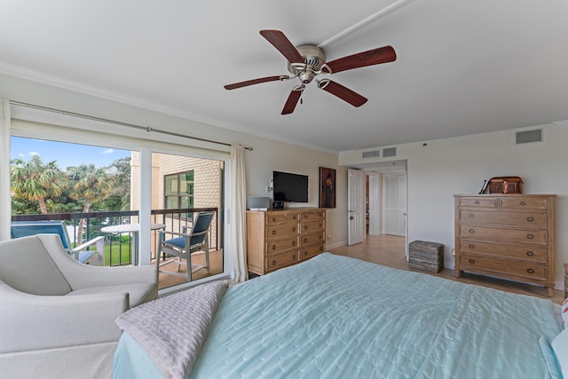 bedroom with ceiling fan and access to outside