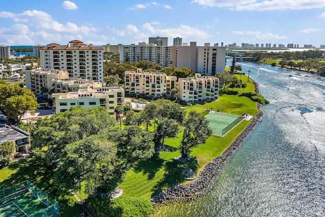 birds eye view of property with a water view