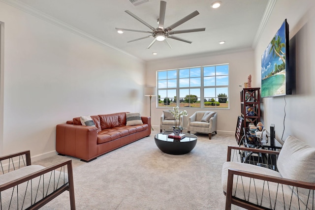 living room with ceiling fan, crown molding, and carpet flooring