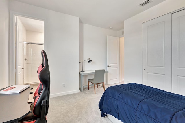 carpeted bedroom featuring a closet