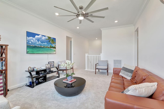 living room featuring carpet floors, ornamental molding, and ceiling fan