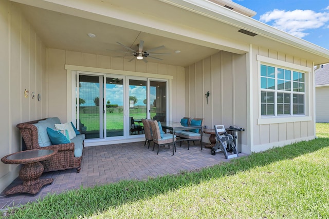 view of patio / terrace featuring ceiling fan