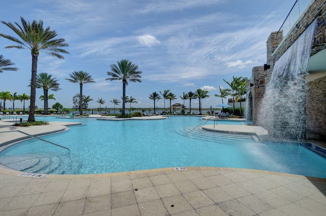 view of pool featuring pool water feature