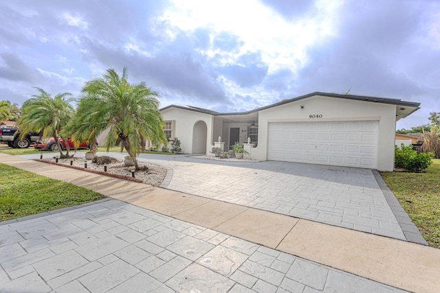 view of front of property featuring a garage