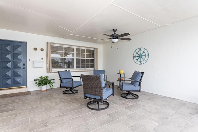 view of patio / terrace featuring ceiling fan