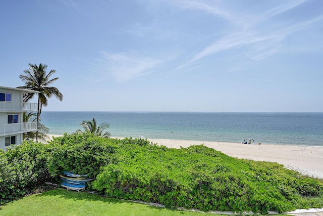 view of water feature with a beach view