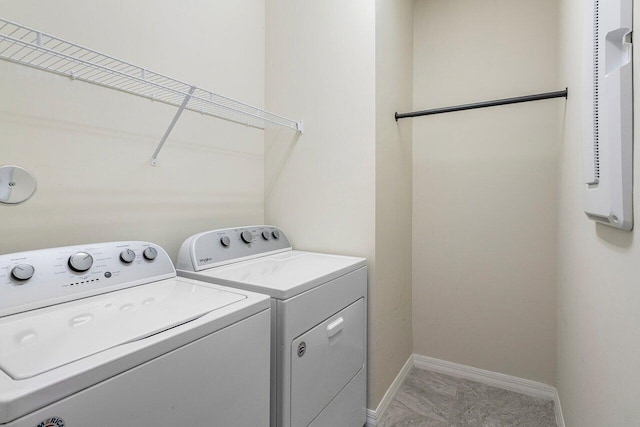 washroom with washer and clothes dryer