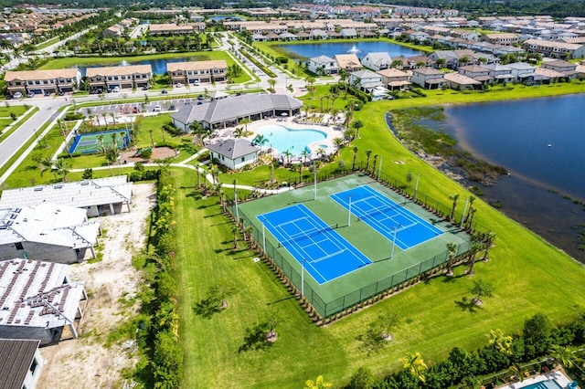 drone / aerial view with a water view