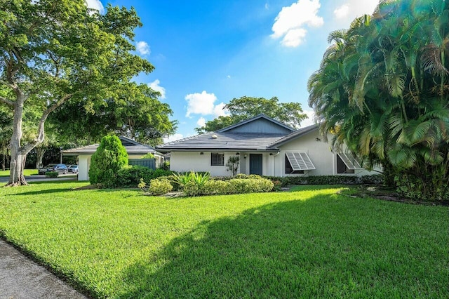 view of front of home with a front yard