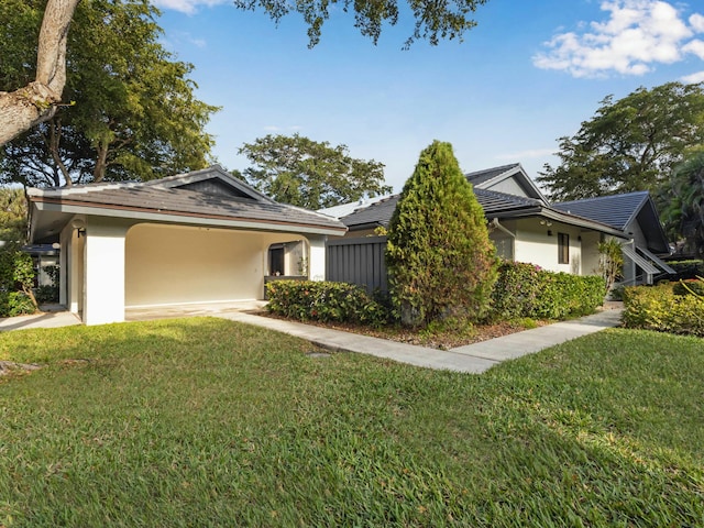 ranch-style house featuring a front yard