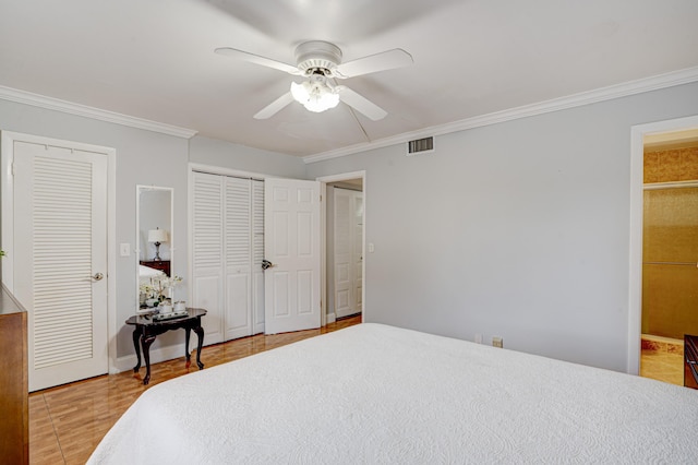 bedroom featuring two closets, ceiling fan, and crown molding