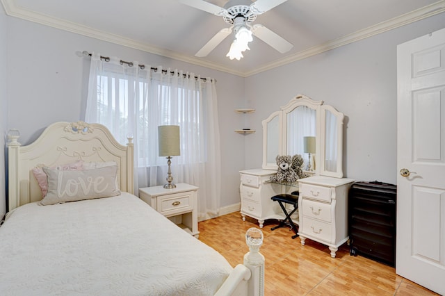 bedroom featuring ceiling fan and crown molding