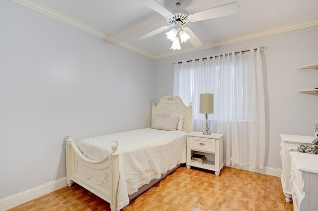 bedroom featuring ceiling fan and crown molding