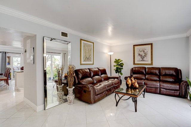 living room with light tile patterned flooring and crown molding