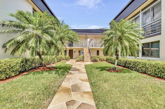 view of front of home with a front yard