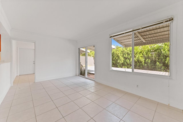 empty room featuring light tile patterned floors