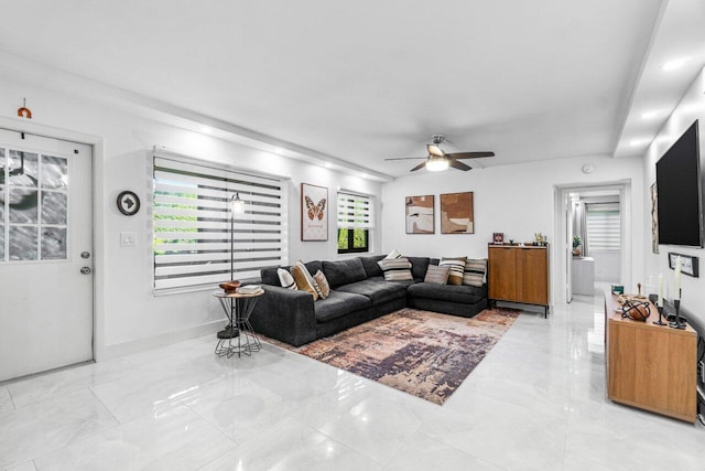 living room featuring ceiling fan