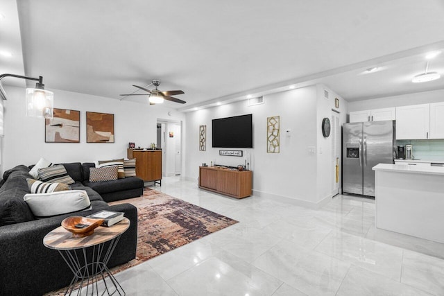 living room featuring ceiling fan