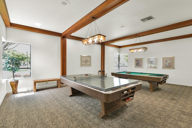 game room featuring dark colored carpet, a wealth of natural light, and beamed ceiling