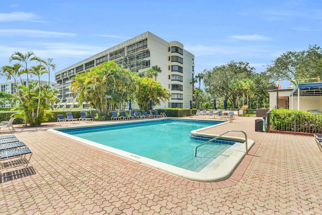 view of pool featuring a patio