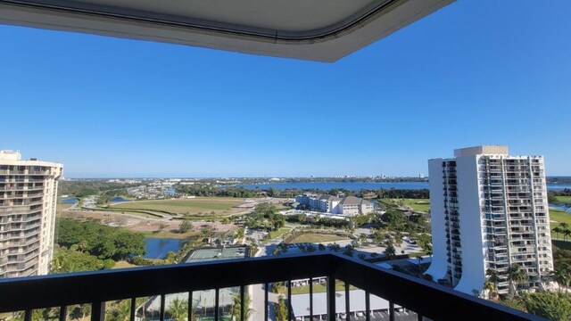 balcony featuring a water view